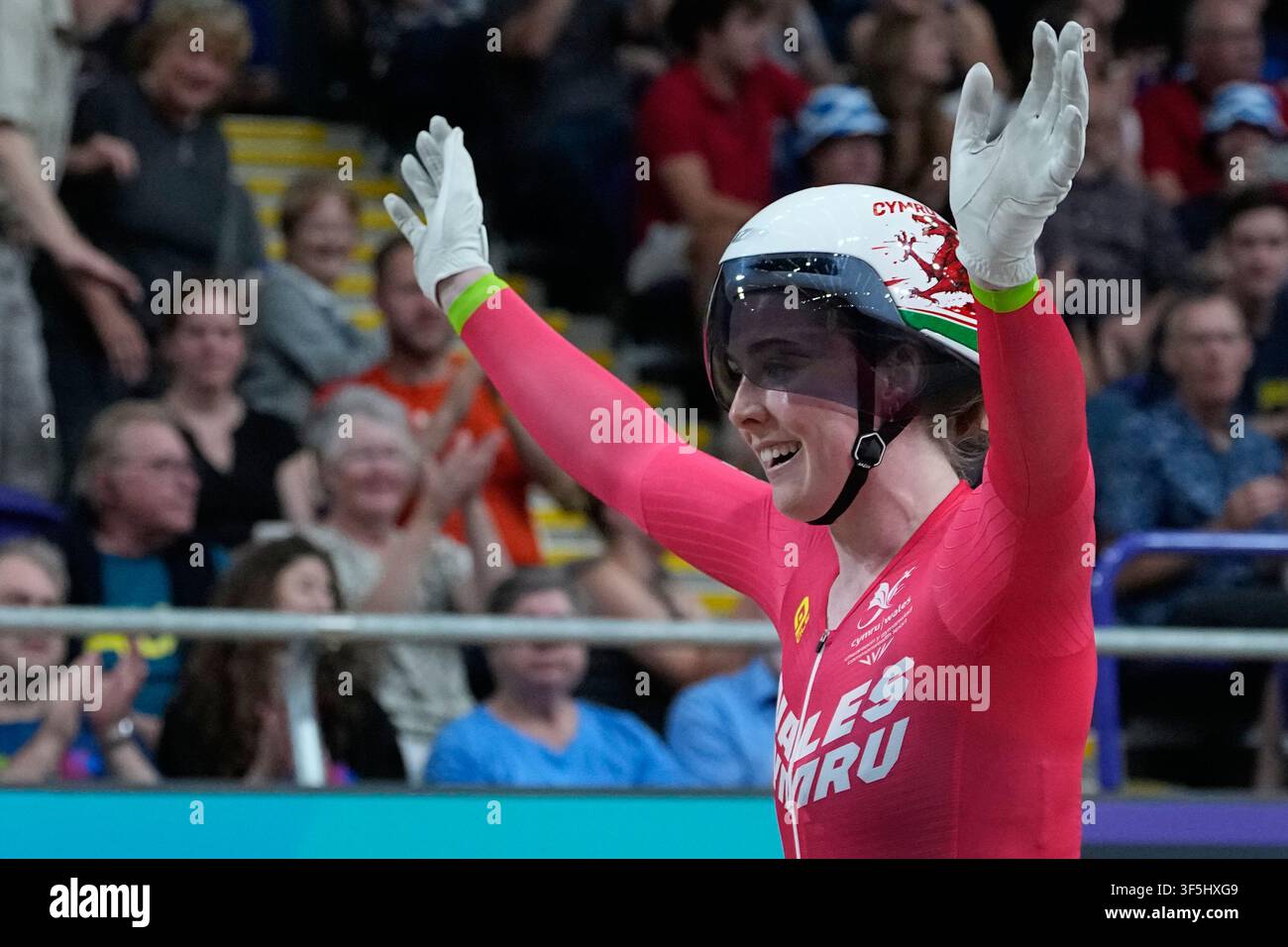 Wales' Emma Finucane celebrates as she wins the women's kern cycle race