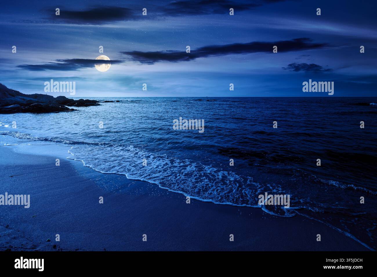 black sea landscape in summer at night. full moon over bulgaria nature landscape with sandy beach. mysterious summer vacation at the sea shore concept Stock Photo