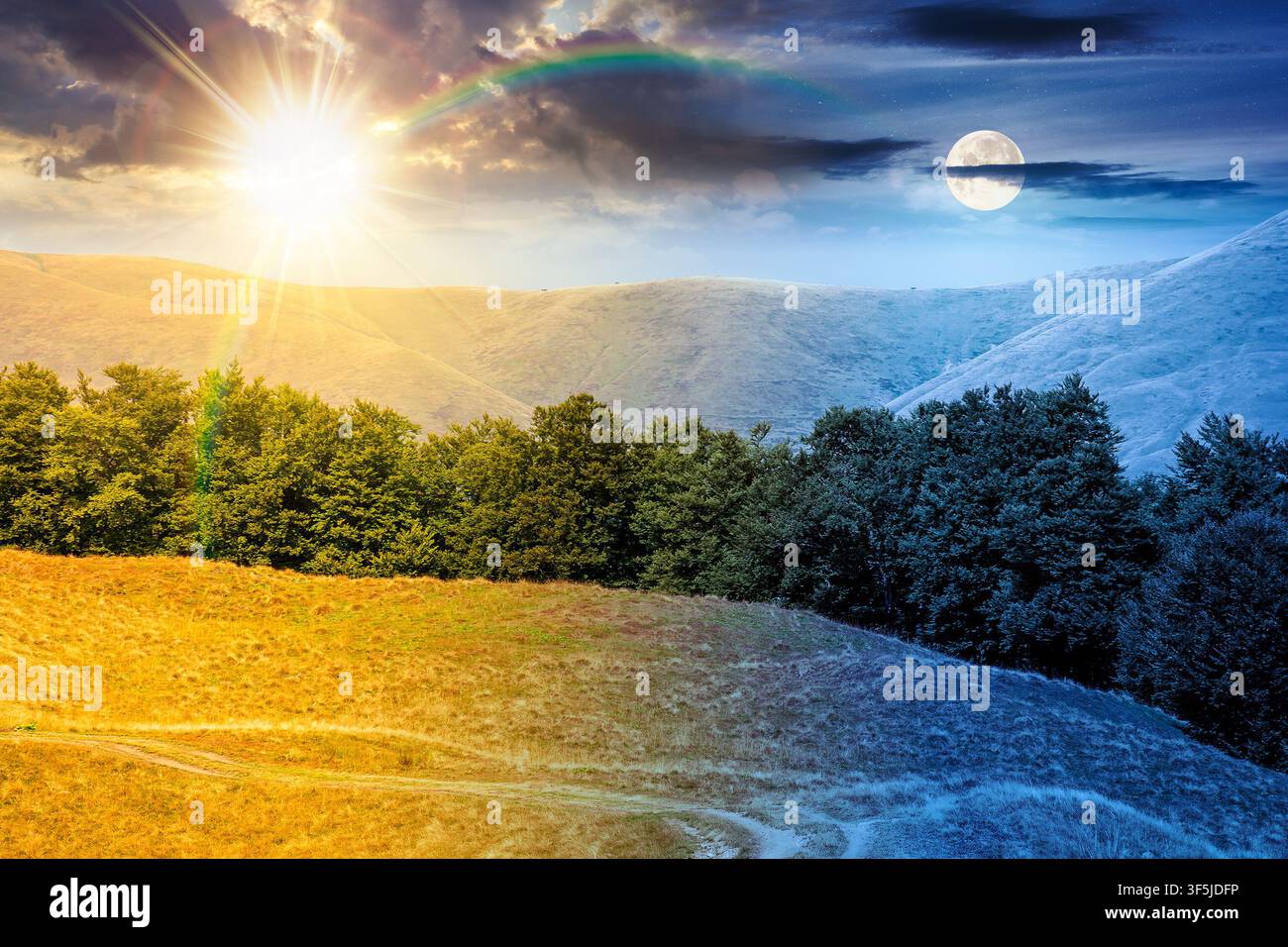 carpathian mountain landscape in summer. day meet night. primeval beech forest on the grassy hill. sun and moon over epic scenery of ukrainian highlan Stock Photo