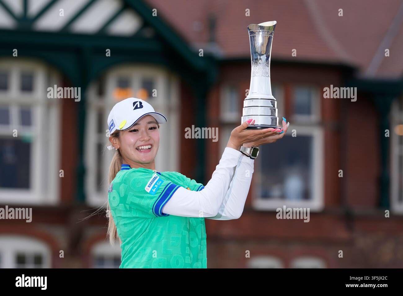 Shiho Kuwaki Of Japan Celebrates With The Trophy After Winning On Day shiho-kuwaki-of-japan-celebrates-with-the-trophy-after-winning-on-day