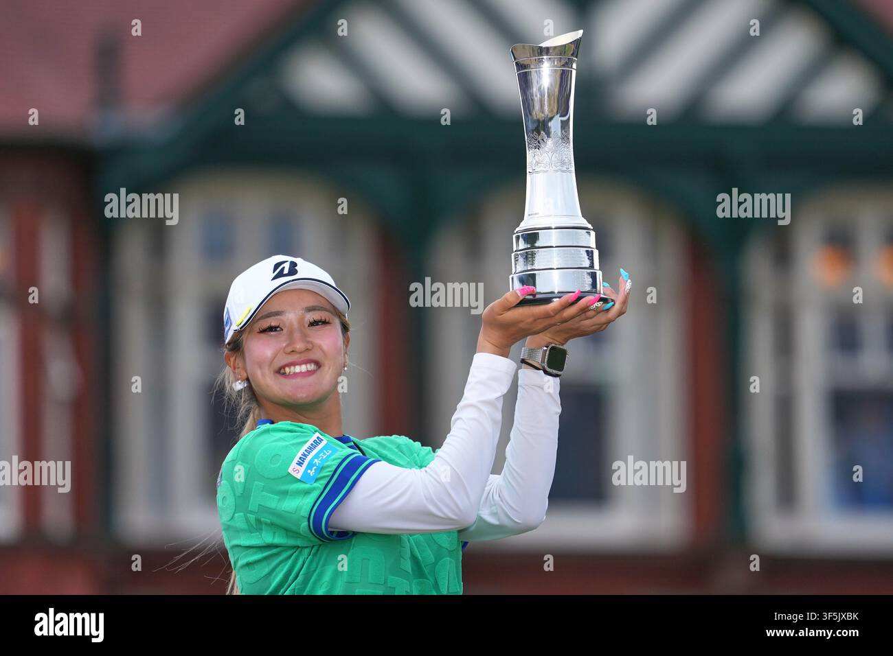 Shiho Kuwaki Of Japan Holds Up The Trophy After Winning The Women s shiho-kuwaki-of-japan-holds-up-the-trophy-after-winning-the-women-s
