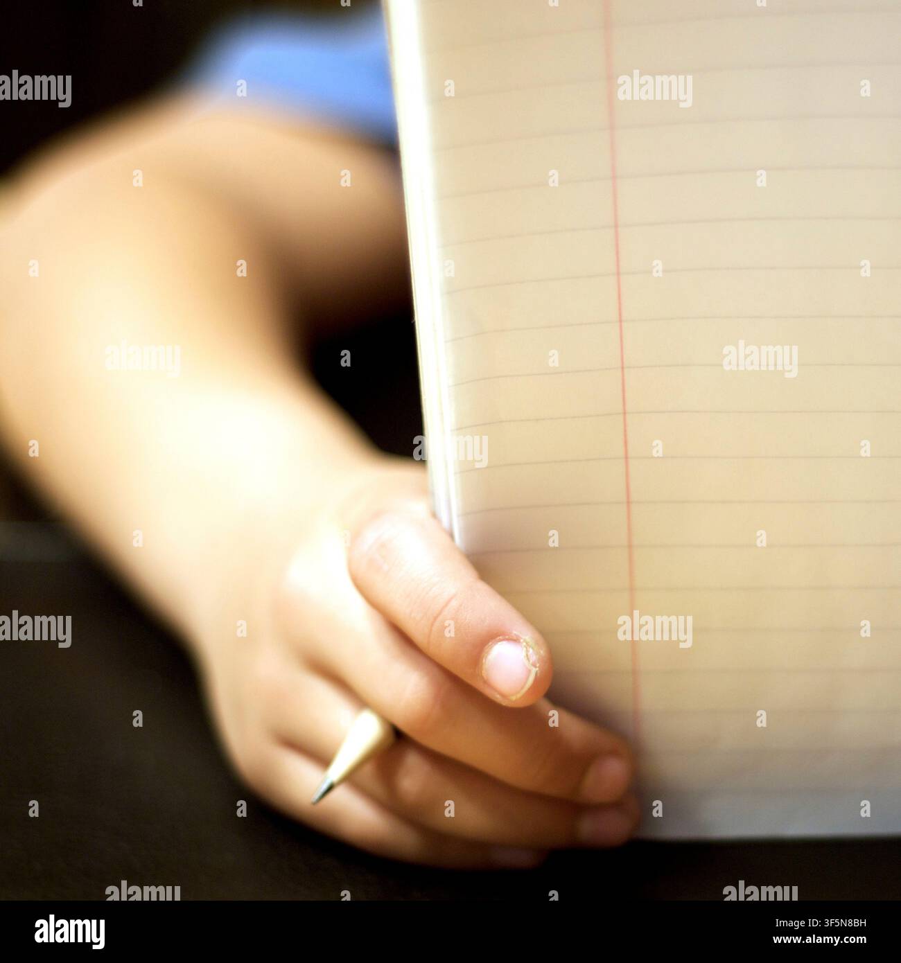 7-year old first grader doing his homework. Stock Photo