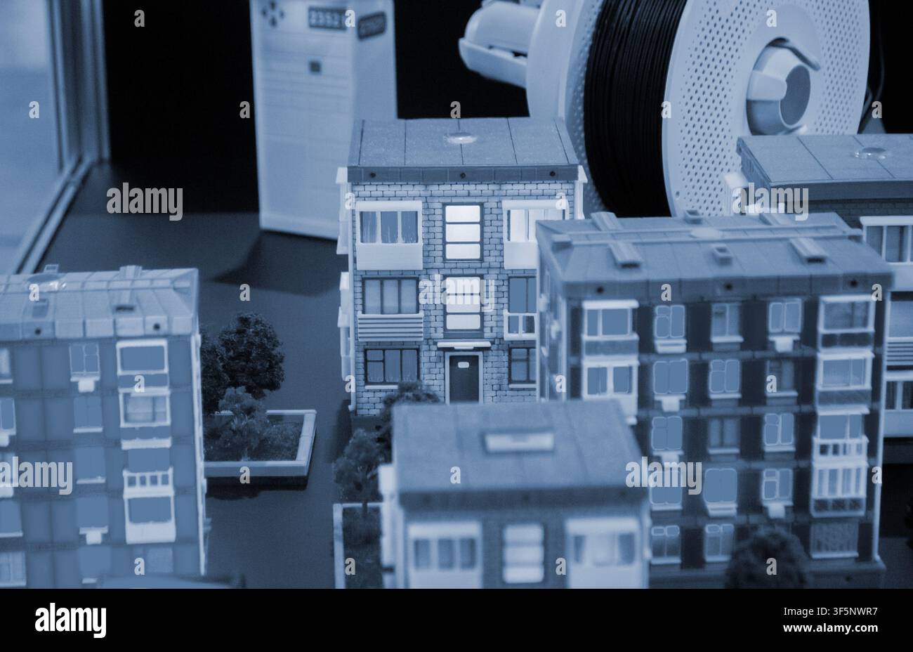 Art models buildings printed on 3D printer. Different objects created on 3D printer from molten plastic. 3D printed different objects. Modern new modern additive progressive technologies. 3D printing Stock Photo
