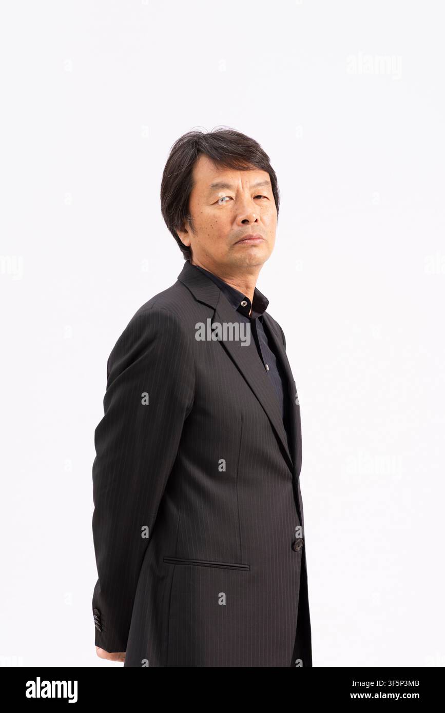 Seated man in dark formal clothing hi-res stock photography and images ...