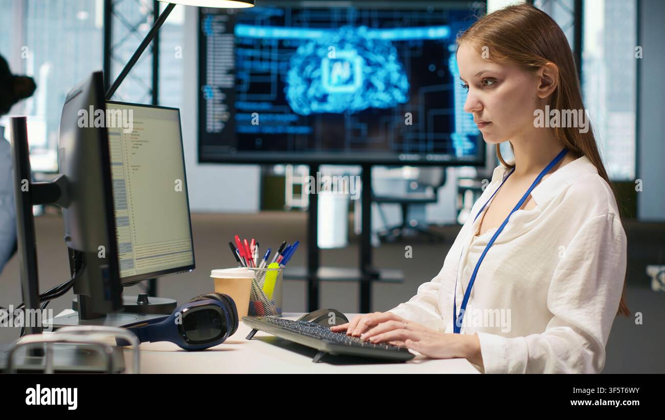 Junior developer optimizing performance using AI LLM chatbot recommendations. Young woman uses artificial intelligence assistant to convert manual workflows into automated scripts, camera A Stock Photo