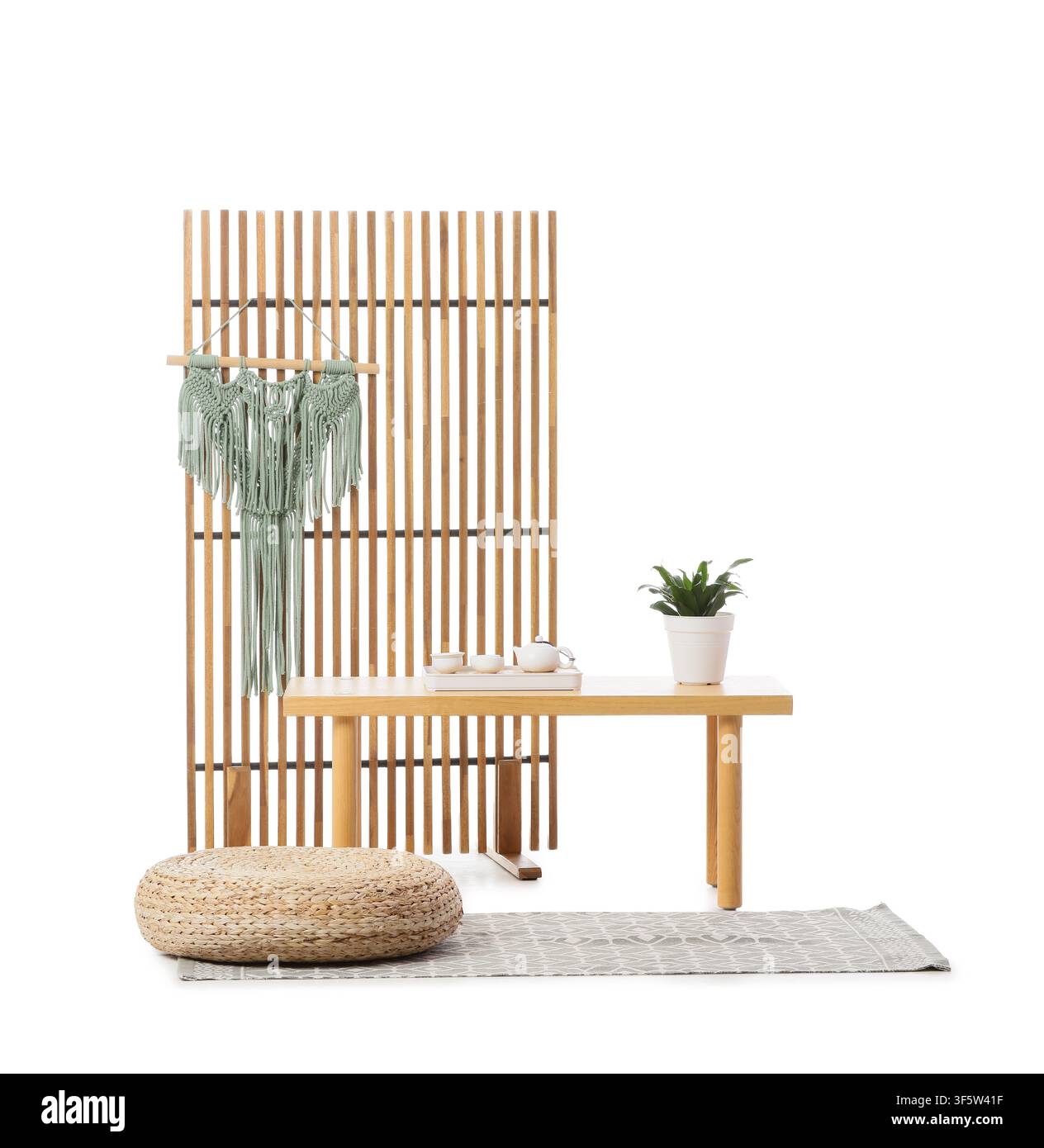 Modern folding screen, bench and pouf isolated on white background Stock Photo