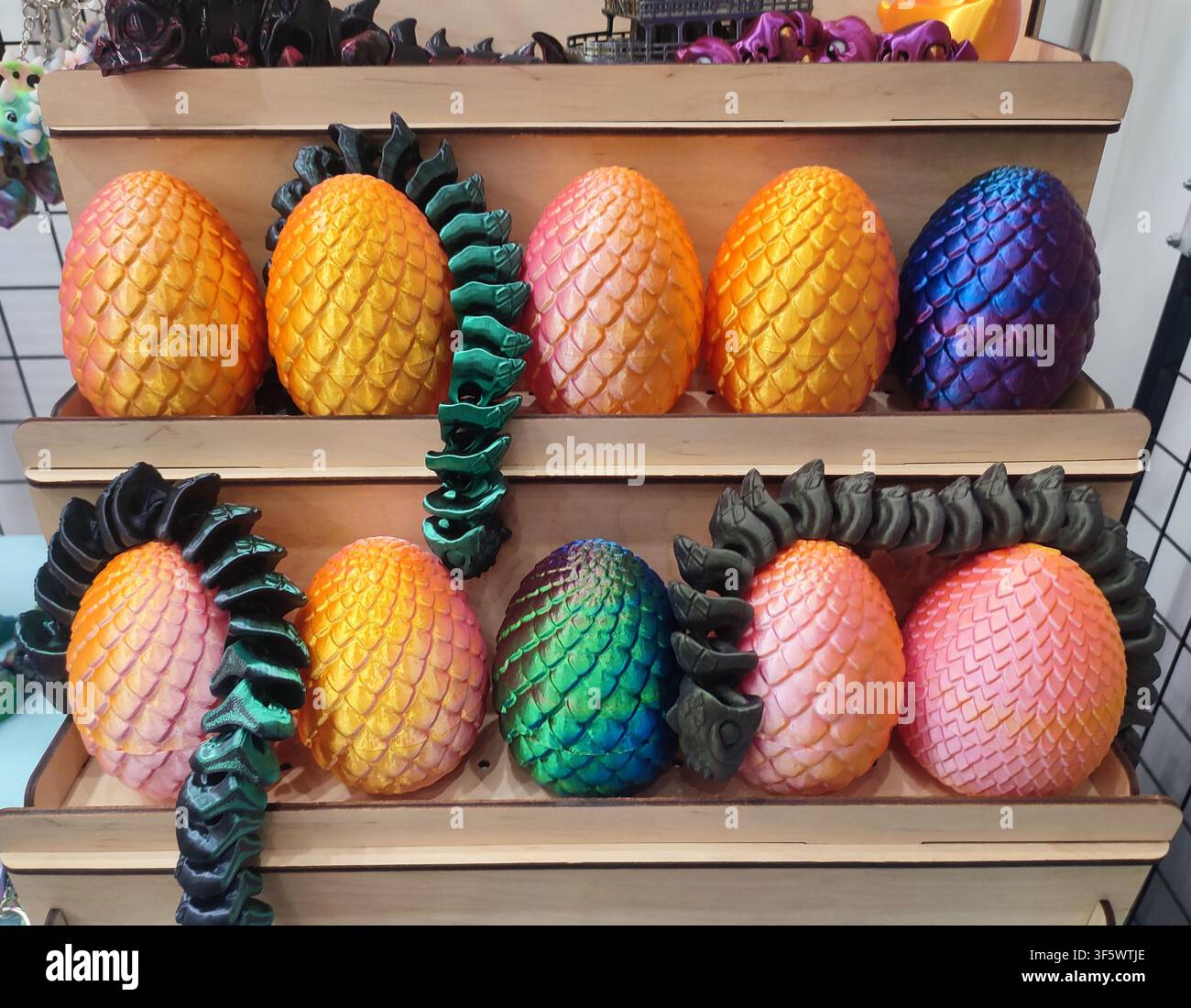 3D printed different art objects. Objects printed on 3D printer from melted colored plastic. Multicolored models created on 3D printer from threads of molten plastic. Modern new additive technologies Stock Photo