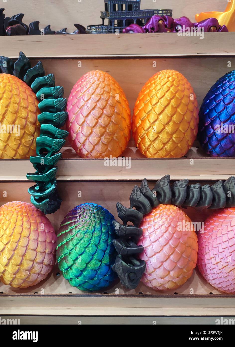 3D printed different art objects. Objects printed on 3D printer from melted colored plastic. Multicolored models created on 3D printer from threads of molten plastic. Modern new additive technologies Stock Photo