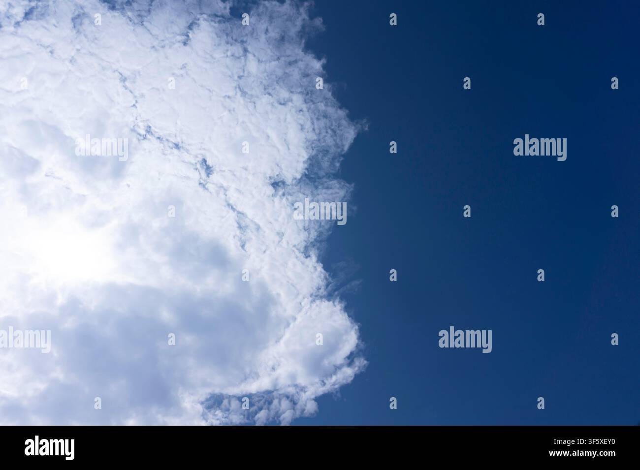 White Clouds in Deep Blue Daylight Sky Stock Photo