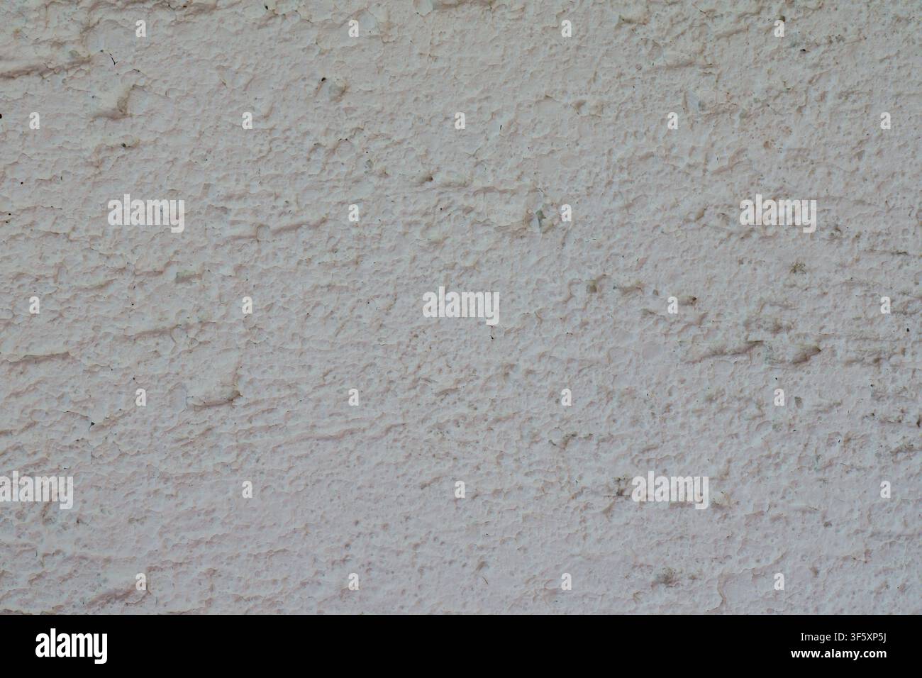 Light relief tile with rough textured surface in close up. Stock Photo