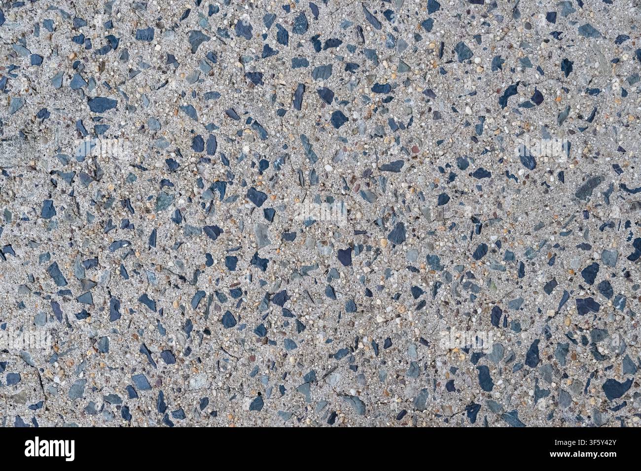 Exposed Aggregate Cement Background Stock Photo