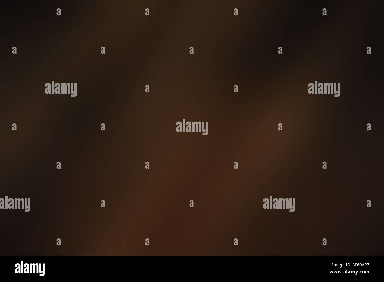 A deep, moody abstract gradient background in shades of brown and black, characterized by a fine, subtle texture throughout. Stock Photo