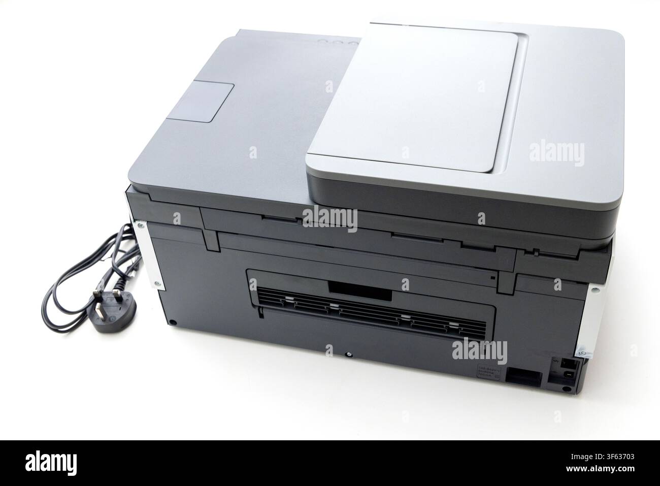 A modern multifunction printer is isolated on a clean white background Stock Photo