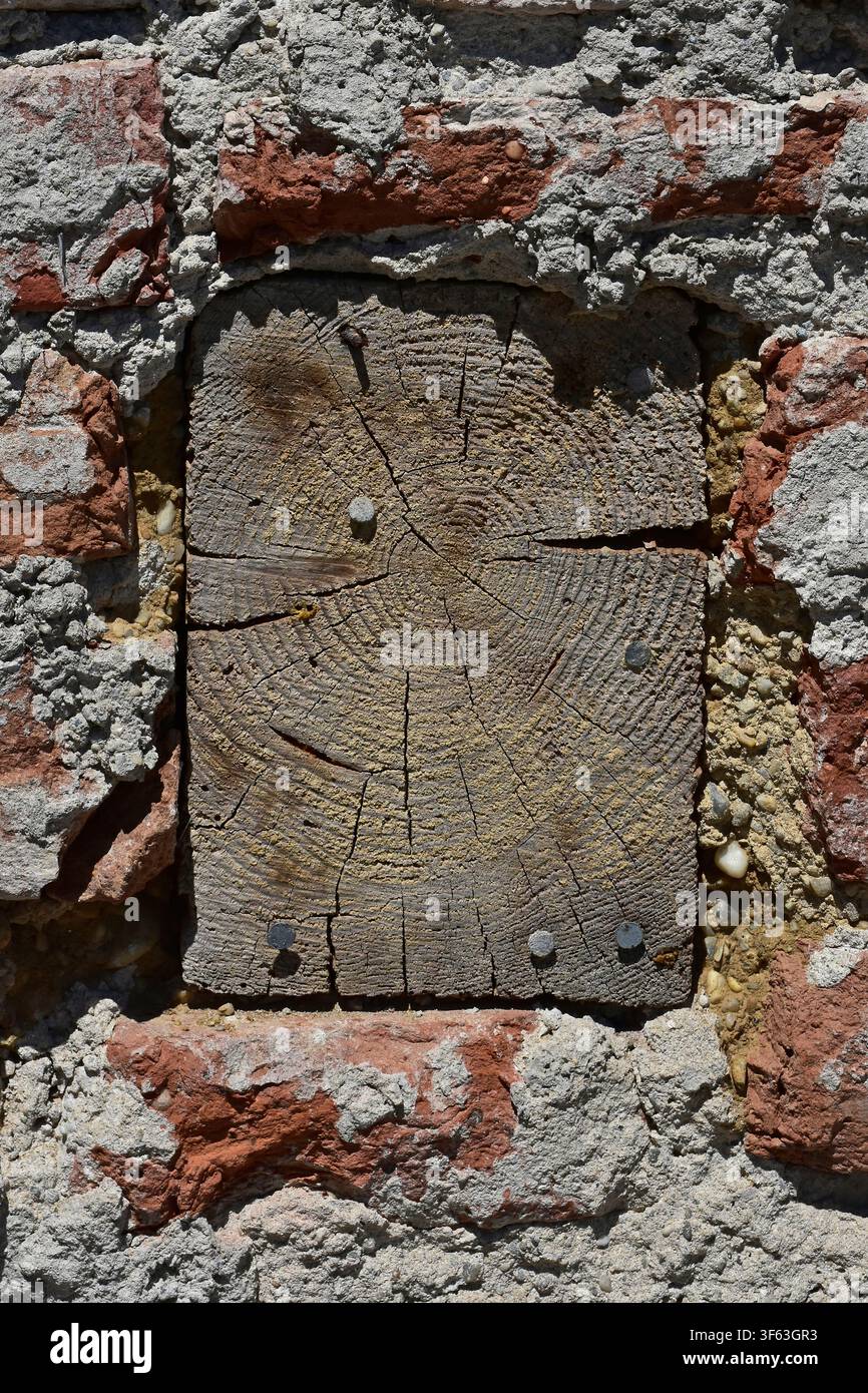 A support beam in old masonry Stock Photo
