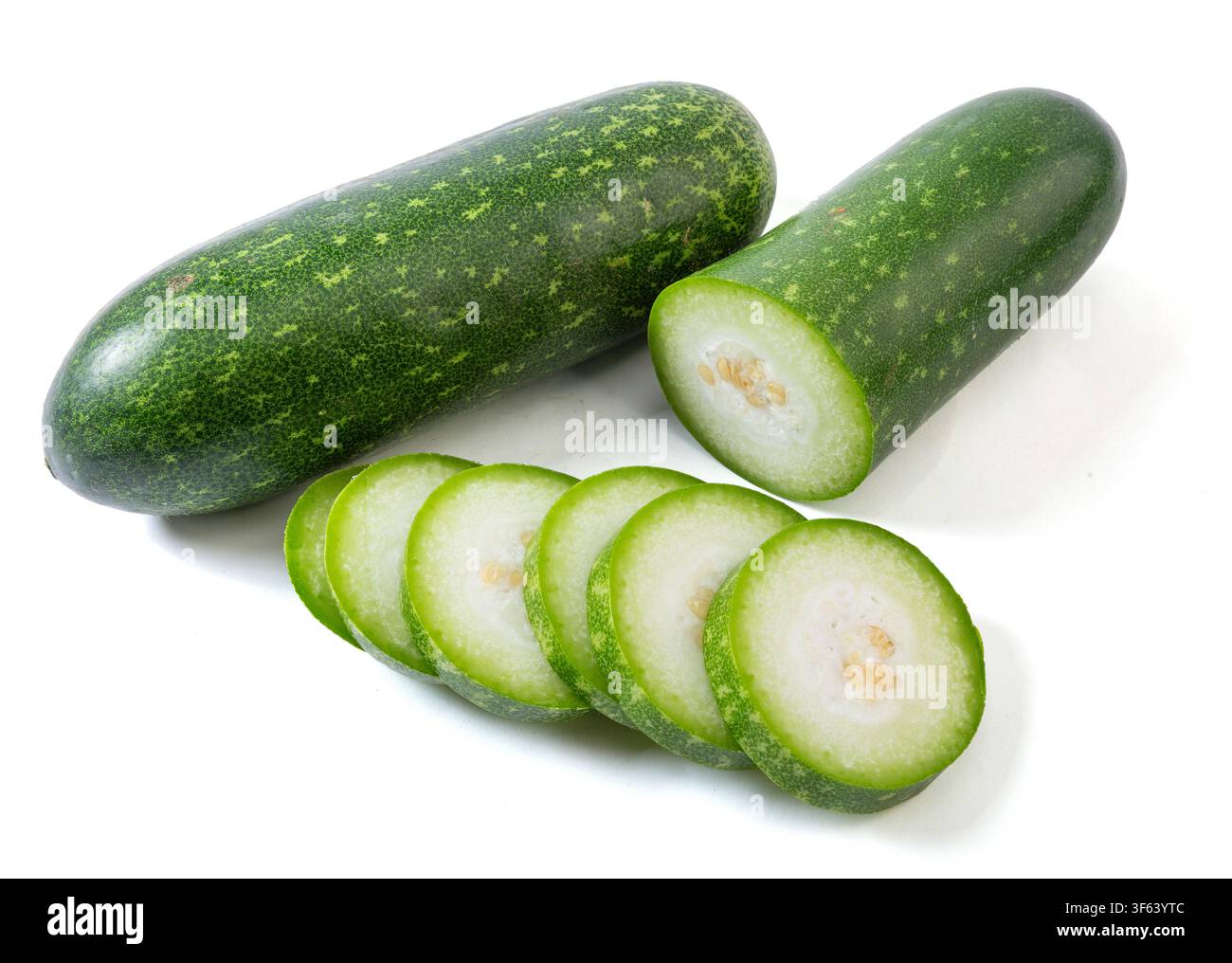 Whole and Sliced Small Green Wax Gourd Isolated on White Stock Photo