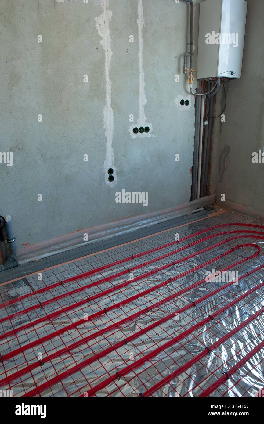 Underfloor surface heating pipes. Low temperature heating concept Stock Photo