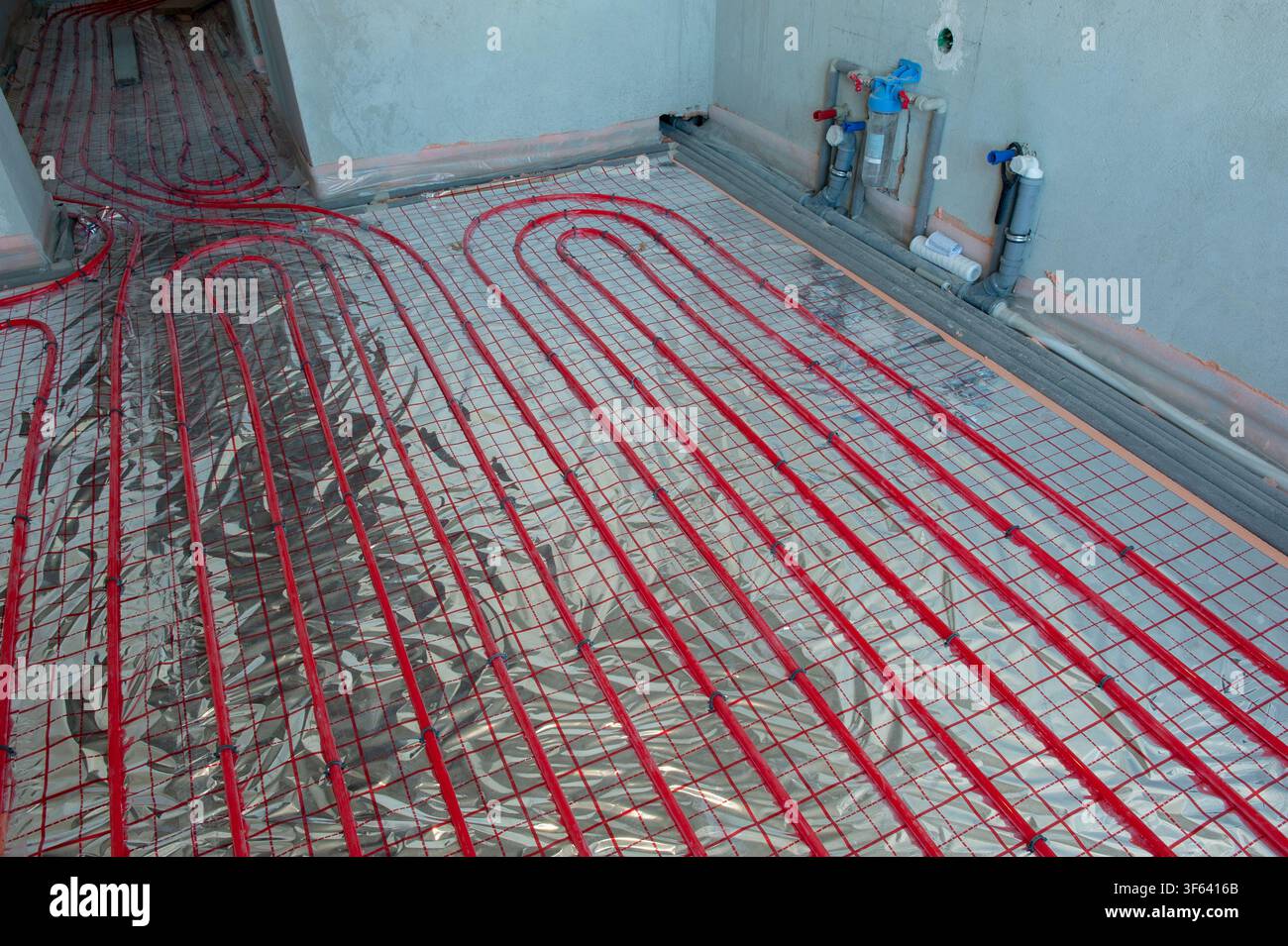 Underfloor surface heating pipes. Low temperature heating concept Stock Photo