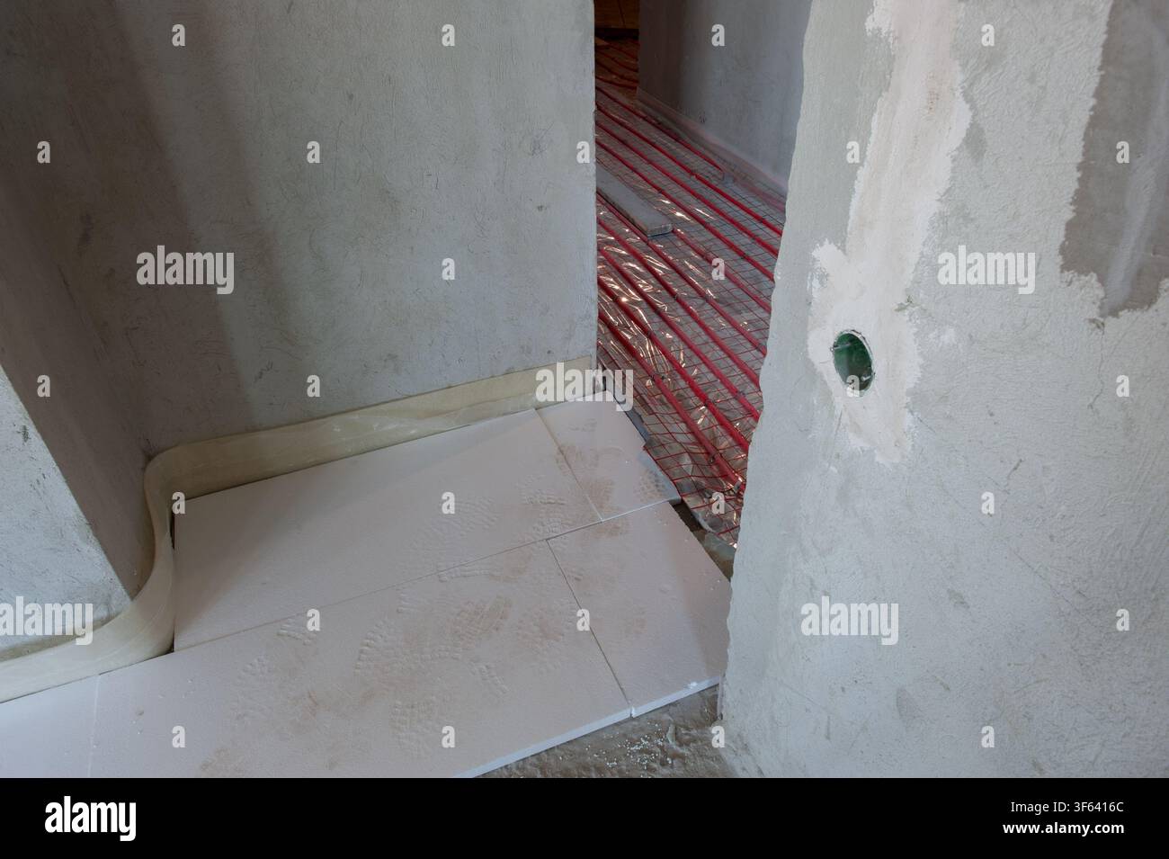 Underfloor surface heating pipes. Low temperature heating concept Stock Photo