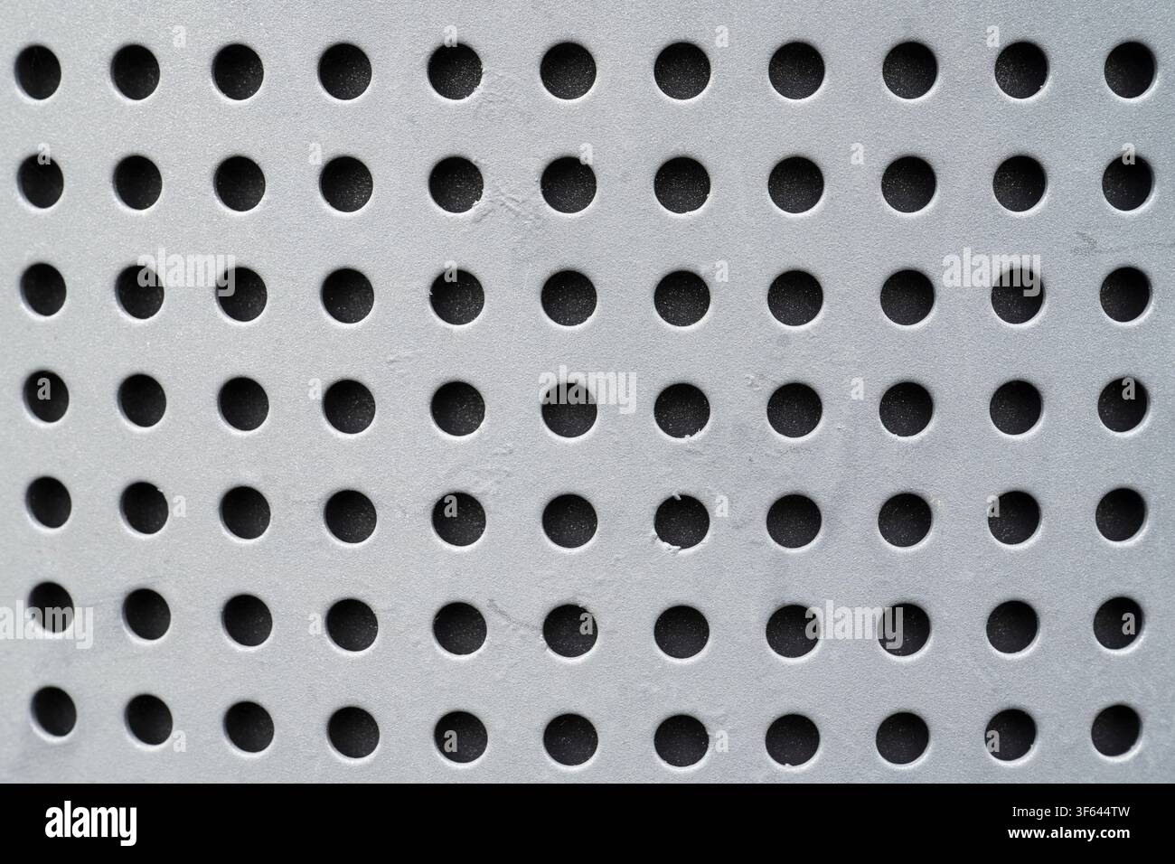 Perforated sheet metal, detail, background image Stock Photo