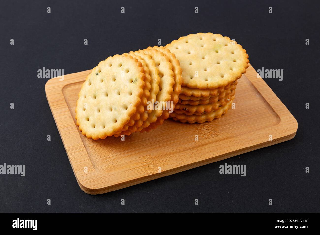 Round Scallion Seasoned Salted Crackers Stack Stock Photo