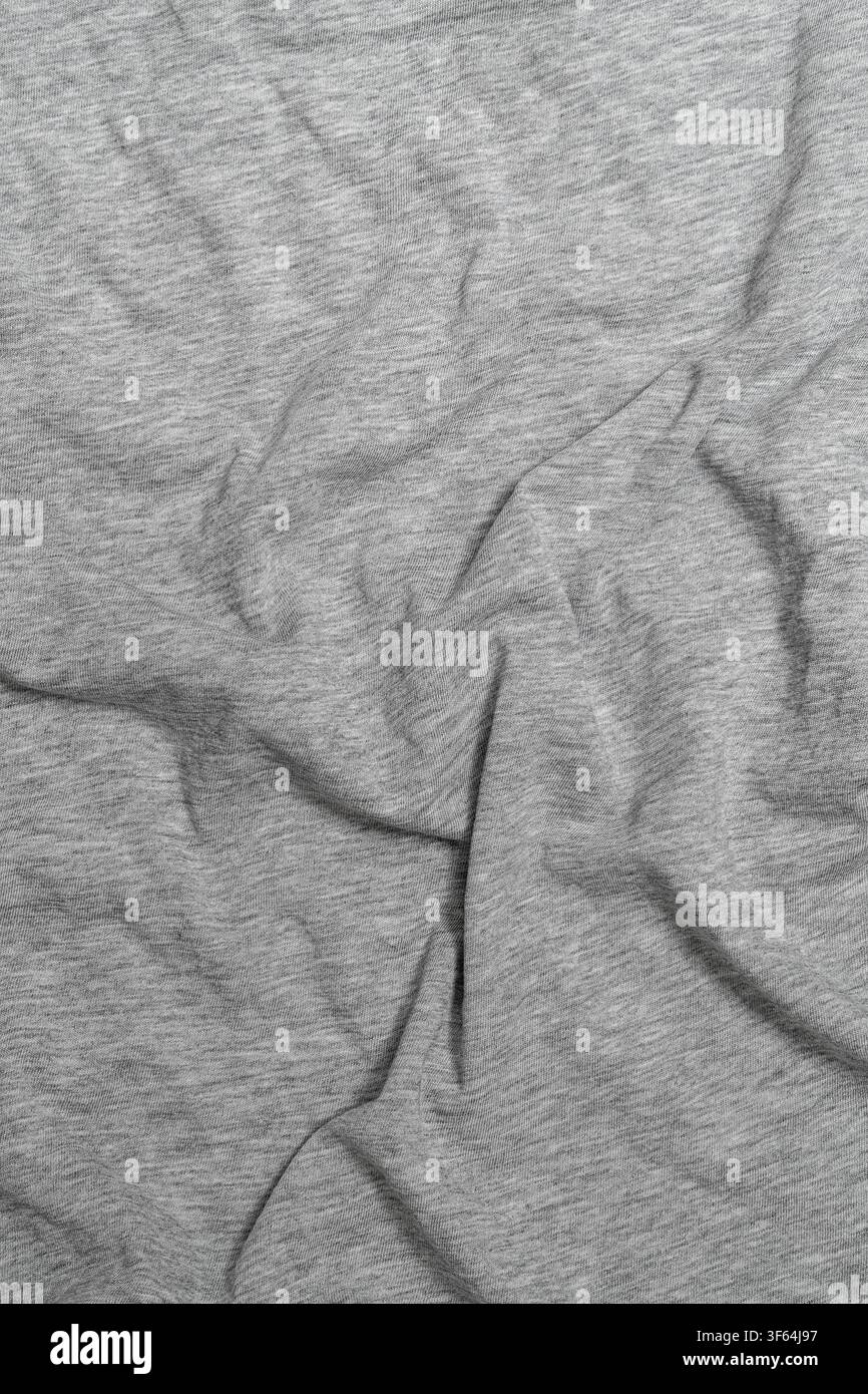 Crumpled light gray heather cotton fabric texture. Stock Photo