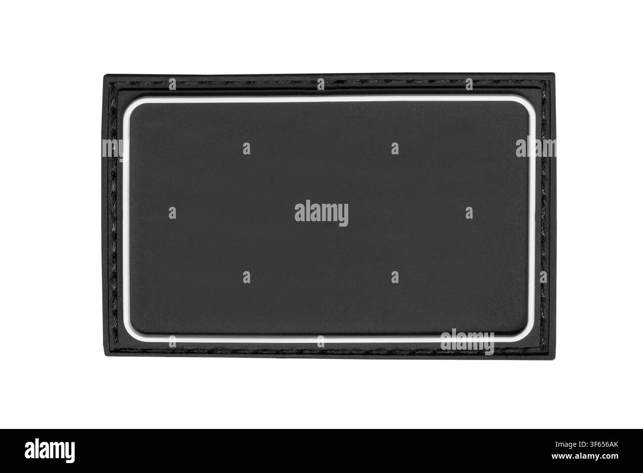 Black rubber blank stitched patch isolated on white background Stock Photo