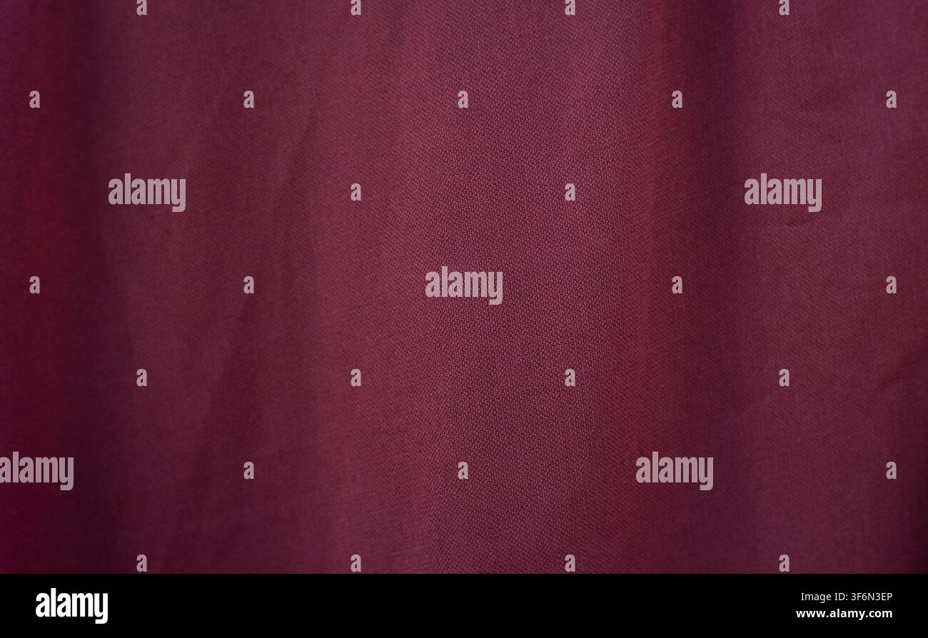 Plain Burgundy Fabric Texture Background With Copy Space Stock Photo
