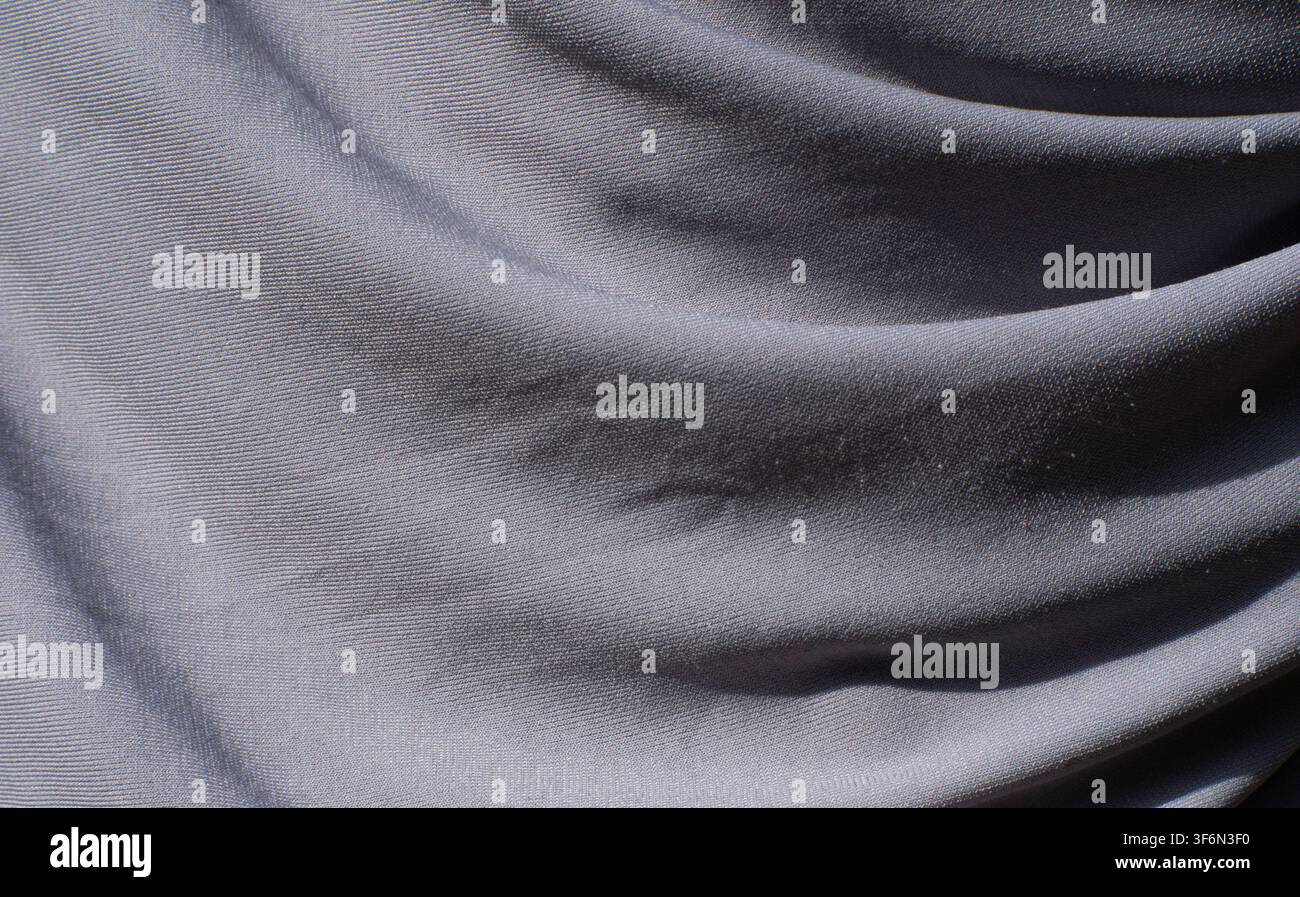 Light Gray Wrinkled Fabric Texture Background Close Up Stock Photo