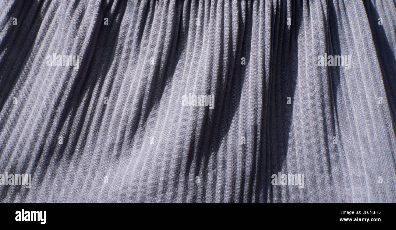 Gray Pleated Fabric Texture Background With Vertical Folds Stock Photo