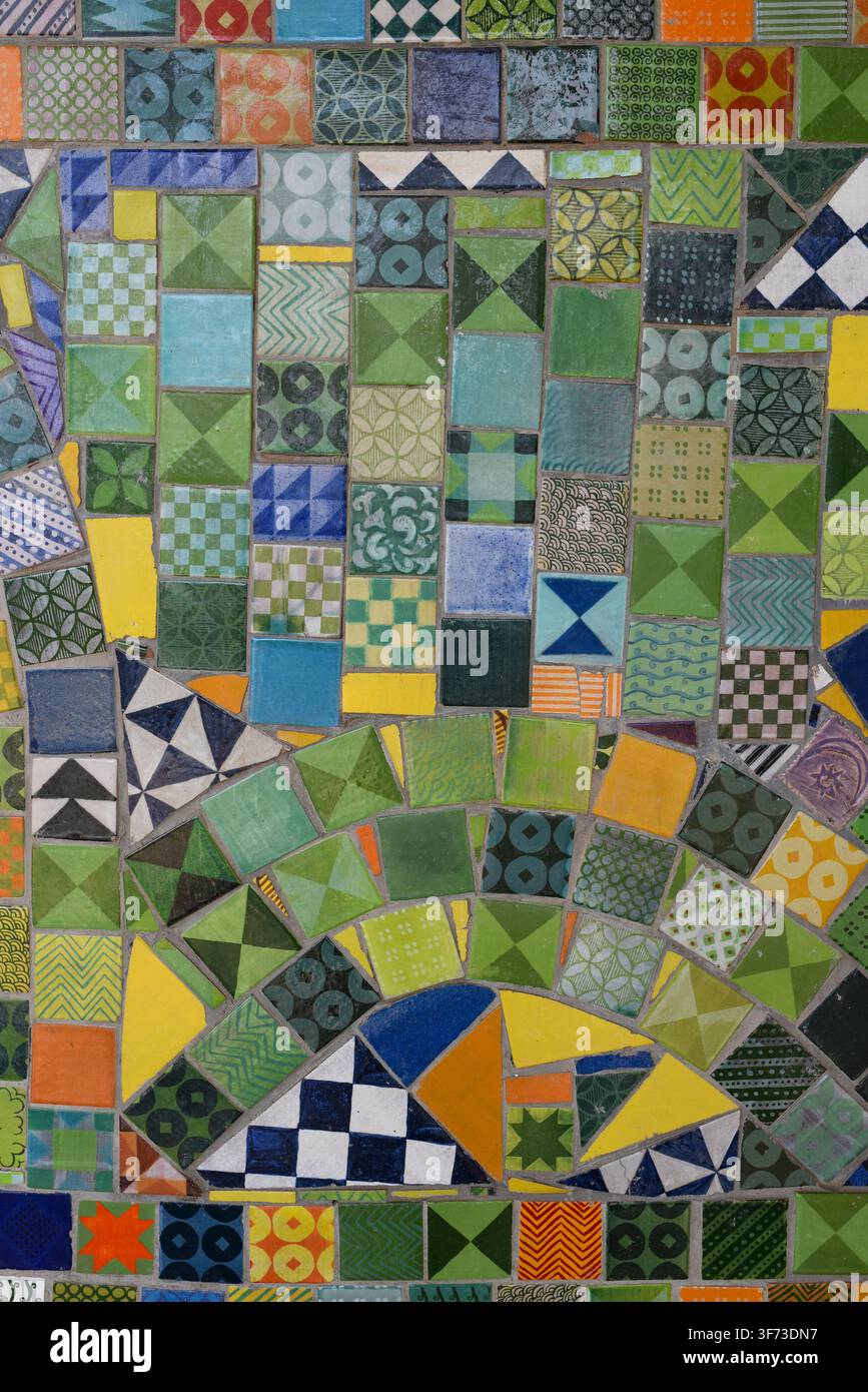 Colorful ceramic tile mosaic with decorative patterns and geometric designs Stock Photo