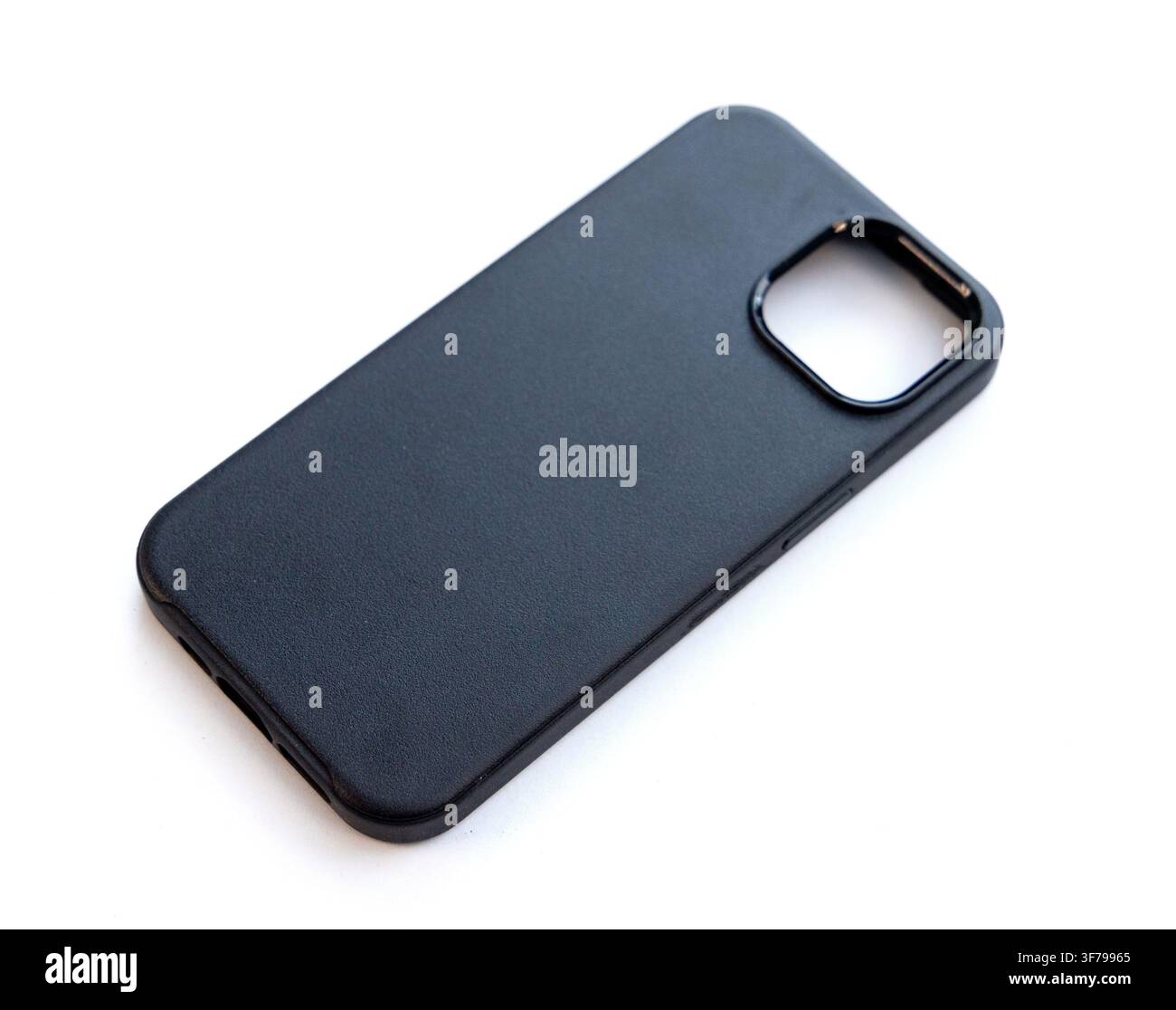 A black smartphone protective case lies on a white background Stock Photo