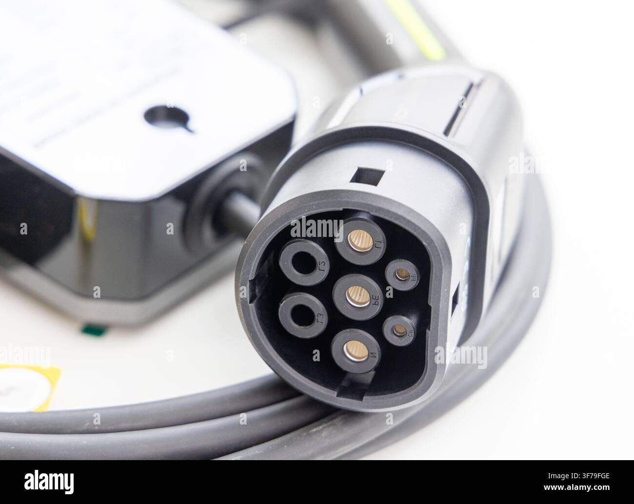 Electric vehicle charging cable with a type two connector plug Stock Photo