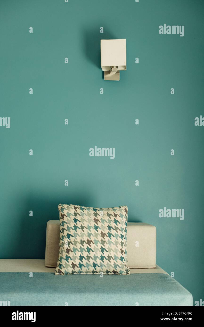 Modern sofa with decorative pillows in a stylish interior Stock Photo