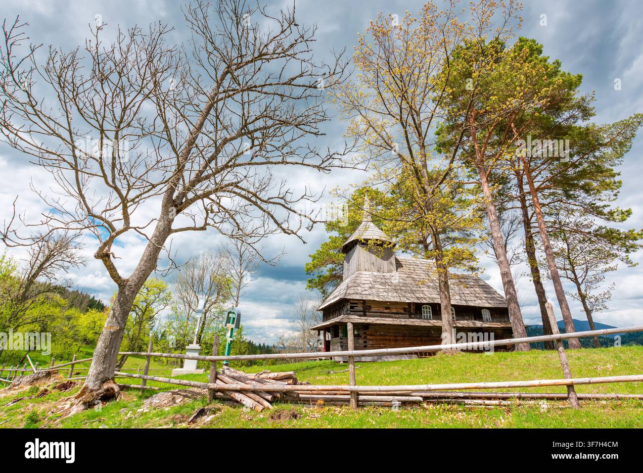 kuzhbeyi, ukraine - 12 may 2019: church on a hill in abandoned village of transcarpathia region, mizhhirya rural district. view of lemko old wooden ar Stock Photo