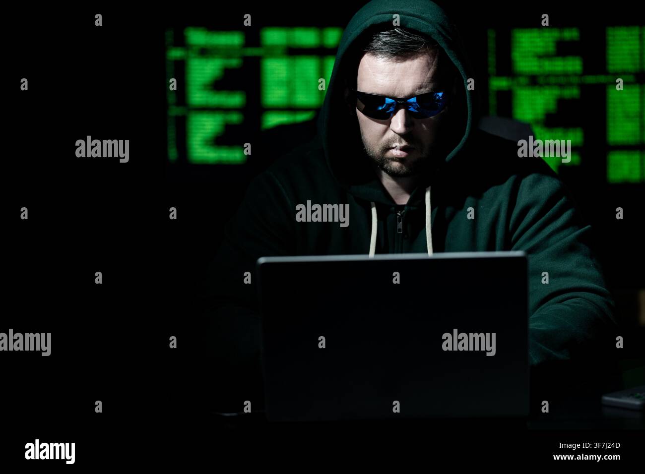 Developer works on secure software. Developer writes protection code system. Developer analyzes network vulnerabilities. Developer prevents cyber Stock Photo