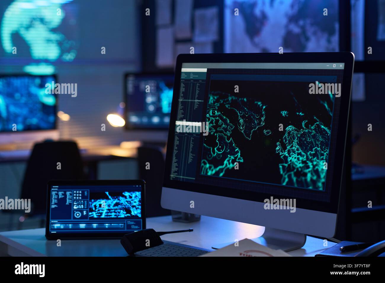 Computer Monitor Displaying Global Cyber Security Data in Control Room Stock Photo