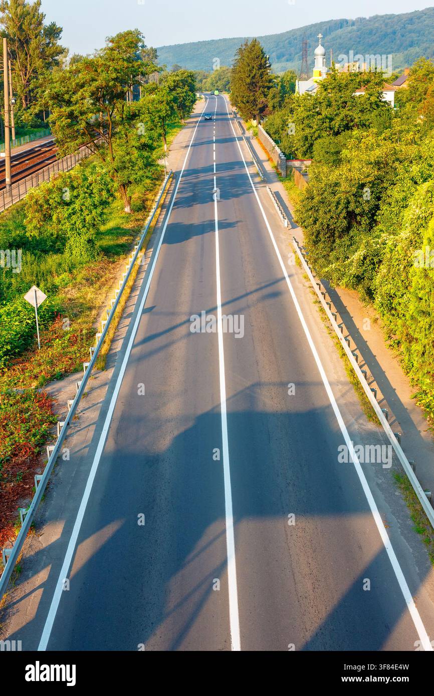 countryside road through carpathian mountains. beautiful summer landscape for ukraine travel background Stock Photo