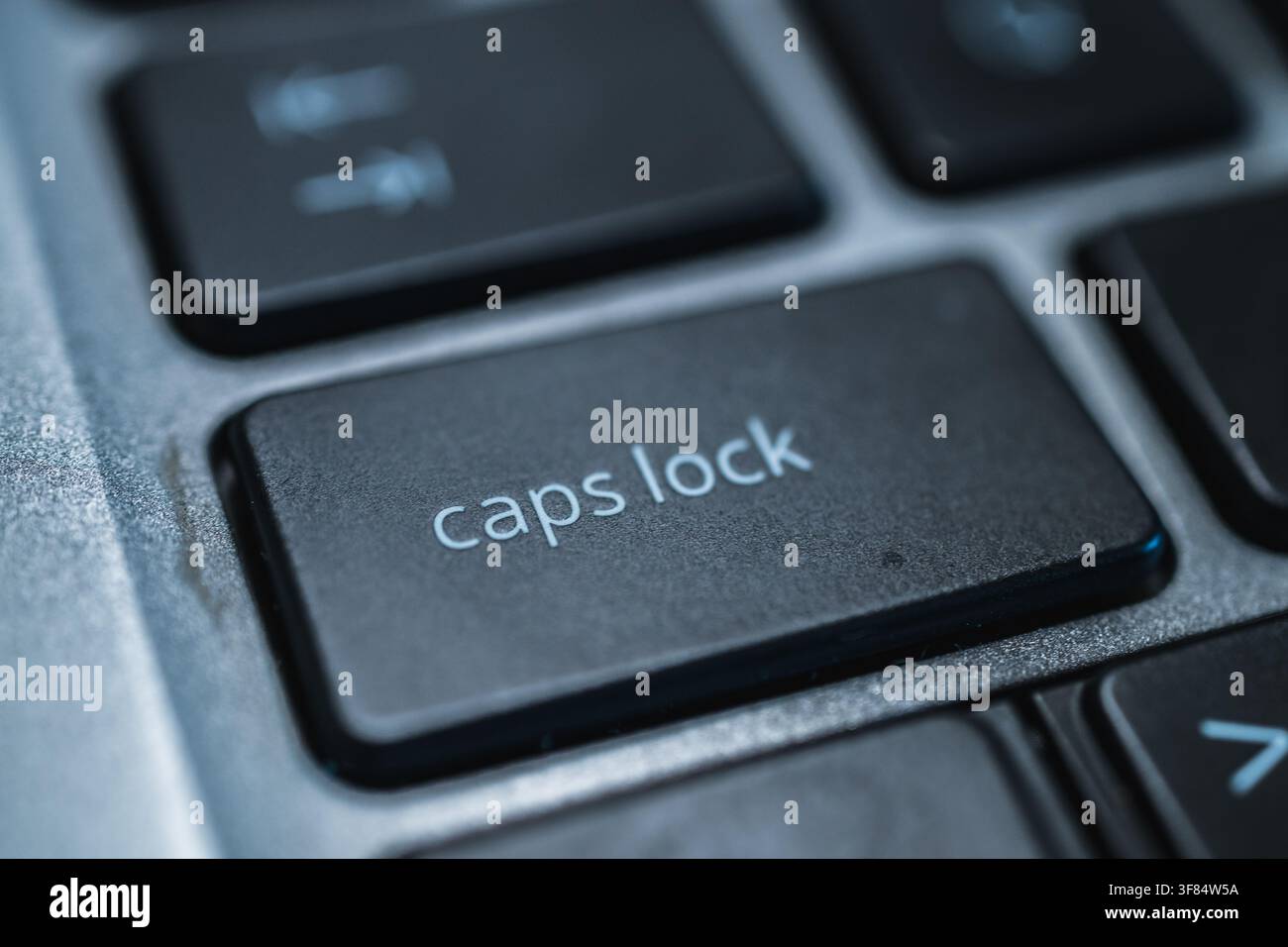 Macro view of caps lock key on computer keyboard Stock Photo