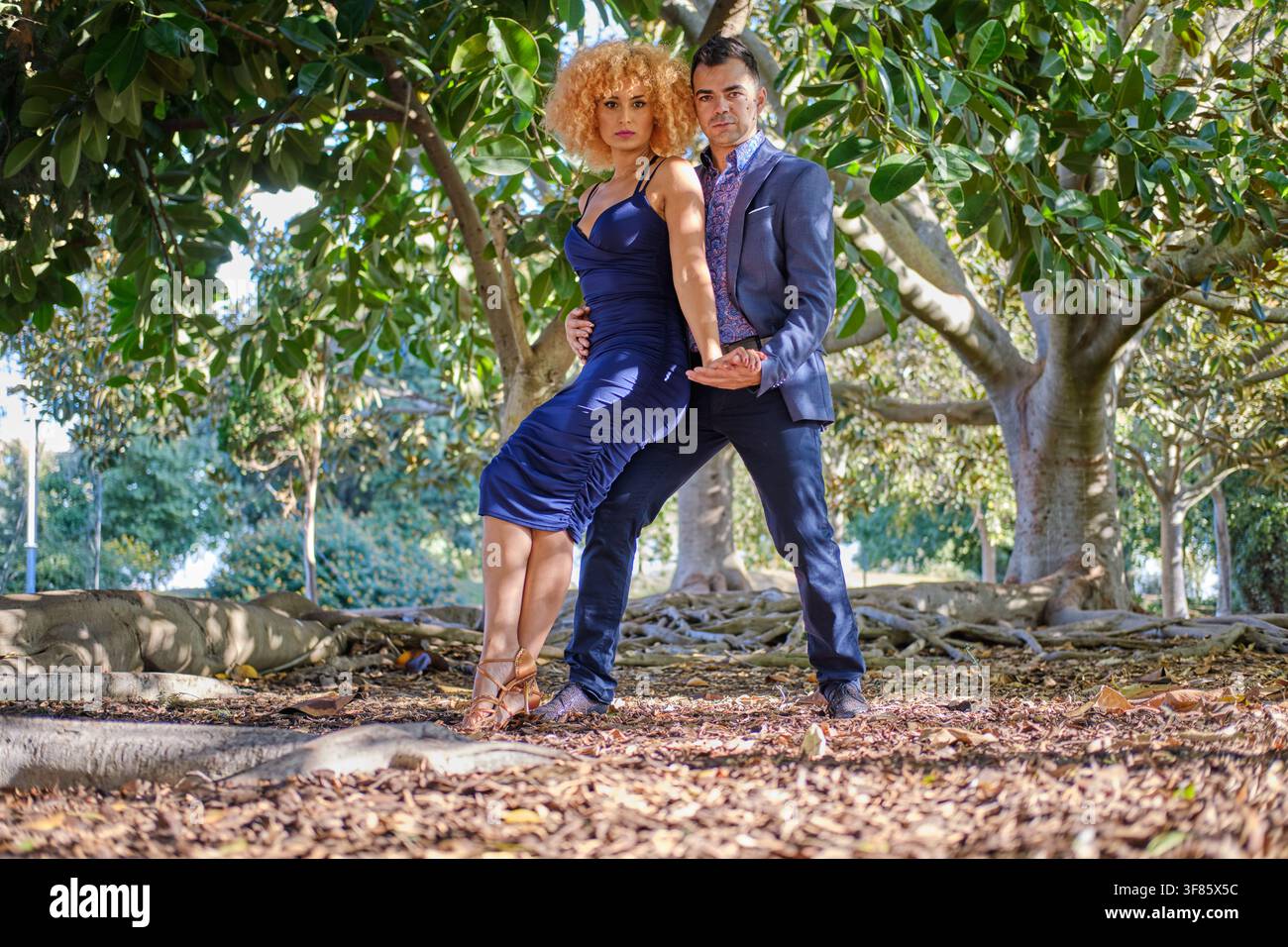 Professional dancers engaging in a passionate performance outdoors Stock Photo