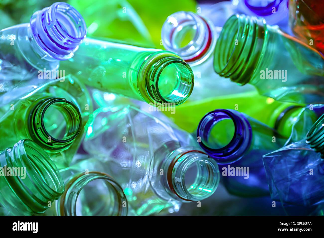 Empty colored drink bottles. Recyclable plastic waste. Stock Photo