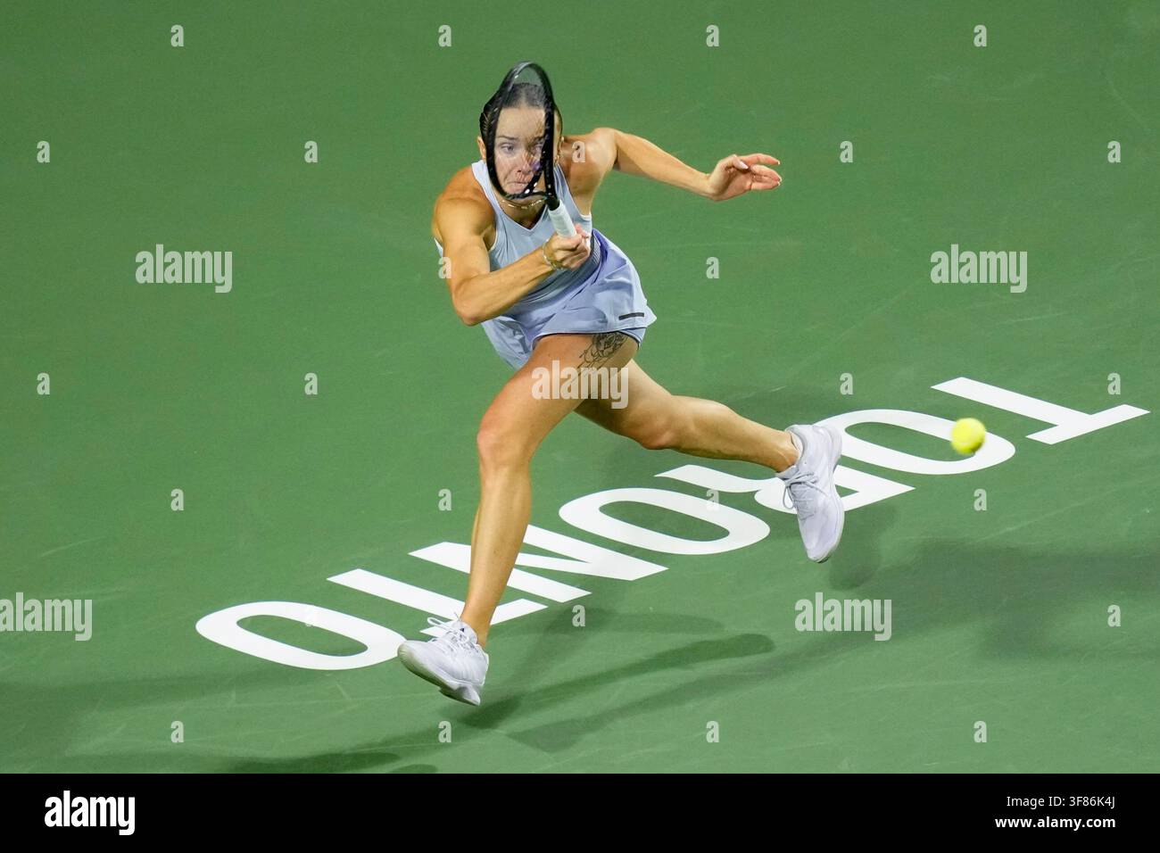 Ukraine's Elina Svitolina hits a return to Ekaterina Alexandrova during ...