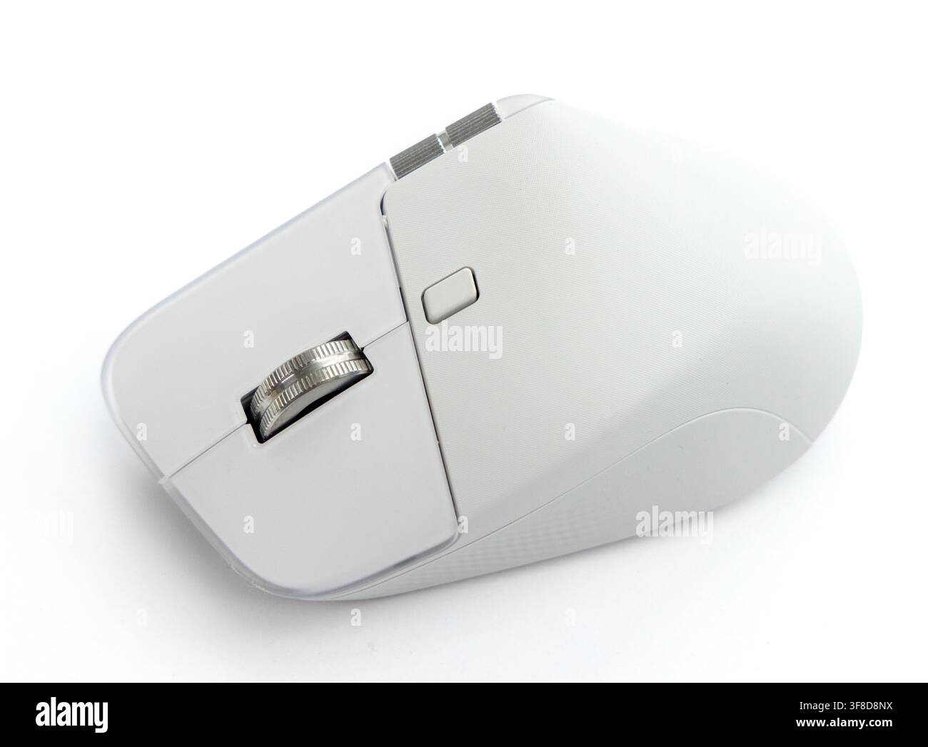 A modern white wireless computer mouse rests on a white background Stock Photo
