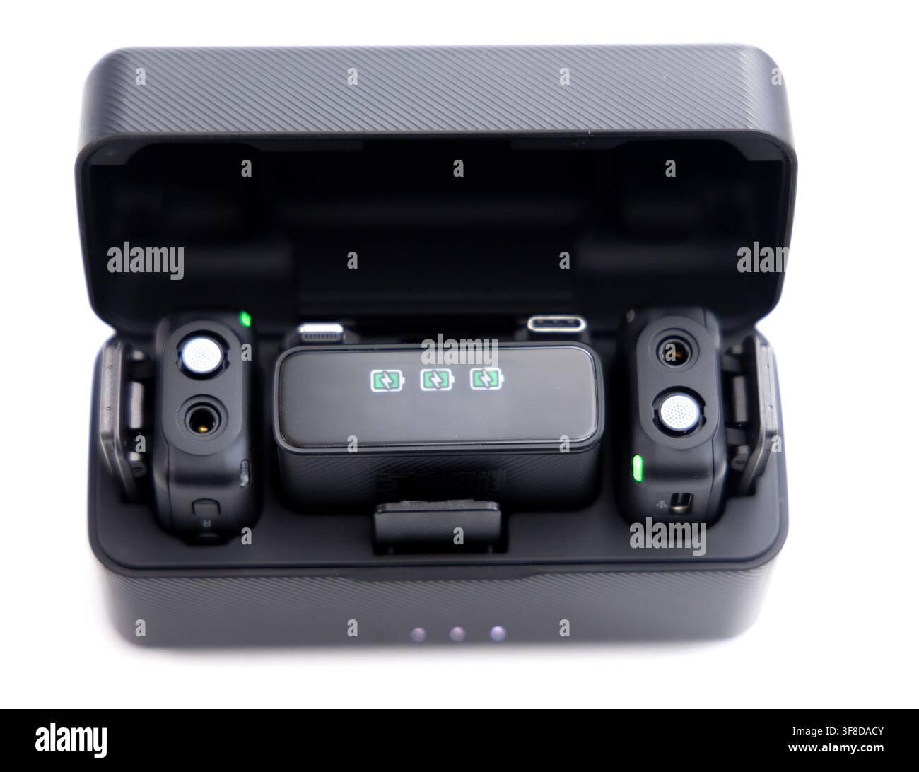 Wireless microphone charging case with two transmitters inside Stock Photo