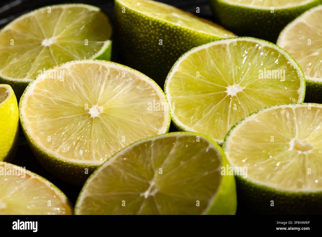 sliced lime on black background Stock Photo