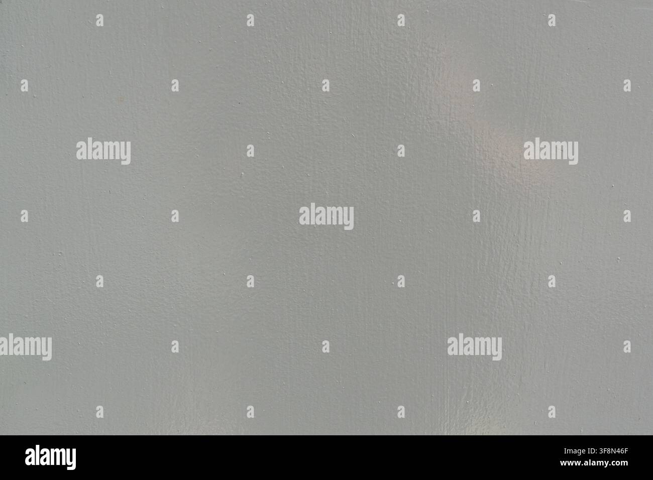 Light grey painted flat metal surface texture background. Stock Photo