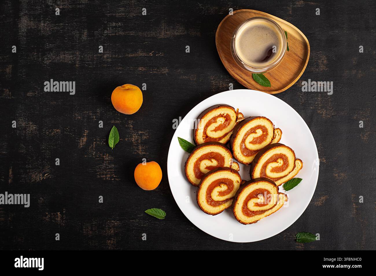 Artisan Swiss Roll Cake with Fruit Filling Overhead View Stock Photo