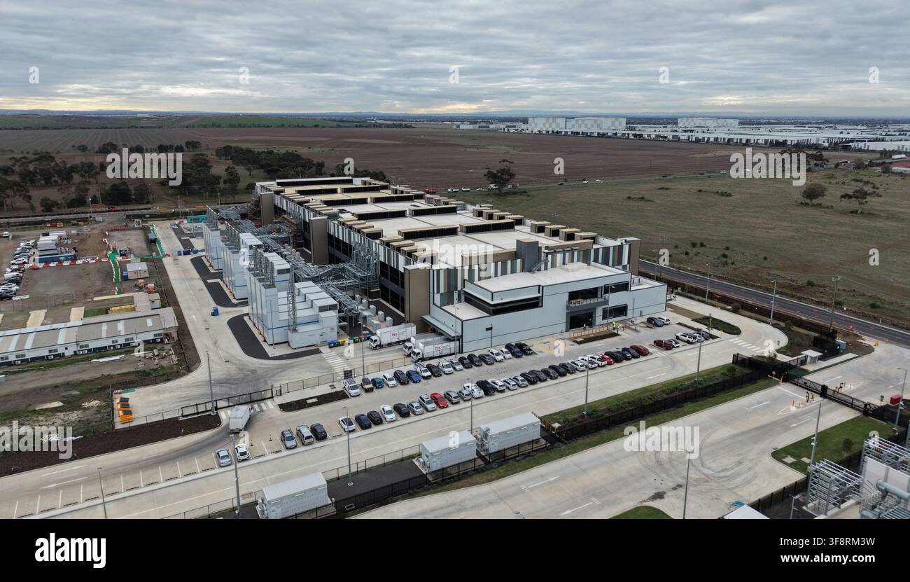 Large data center campus housing multiple buildings, external cooling systems, and extensive network infrastructure Stock Photo