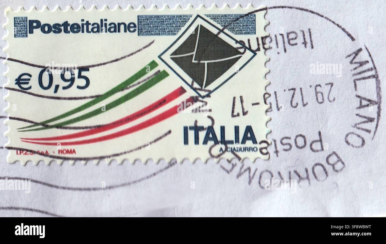 Modern Italian postage stamp for priority mail with Milano Borromeo postmark cancel Stock Photo