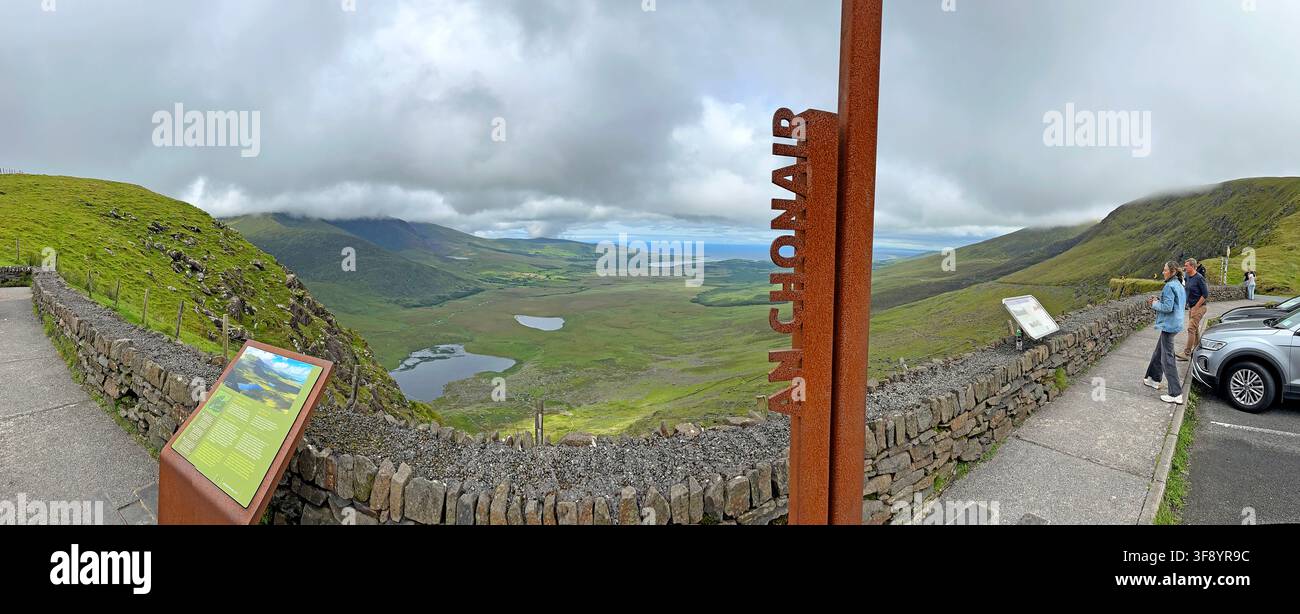 Conor Pass mountain landscape panorama and road viewpoint on the Dingle Peninsula, County Kerry, Ireland, under low cloud. Ireland tourist travel Stock Photo