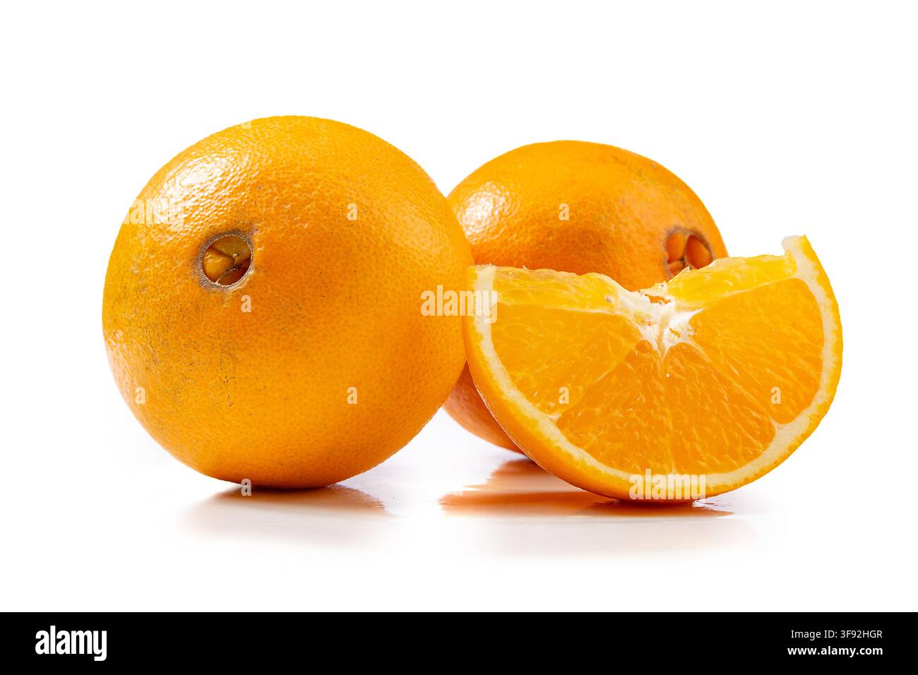 Fresh Navel Oranges Whole and Halved Showing Pulp Stock Photo